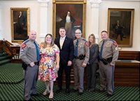 (Pictured left to right: DPS Cpl. Joshua Moer and his wife, Camela, Sen. Pat Fallon, DPS Director Steven McCraw, DPS Staff Kristi Burchett and DPS Sgt. Jeffrey Jinks)